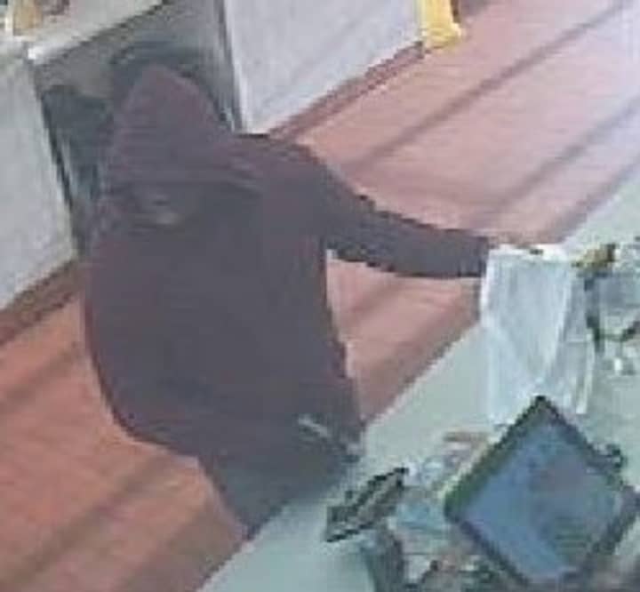 A man is wanted after an armed robbery at McDonald&#x27;s in Commack.