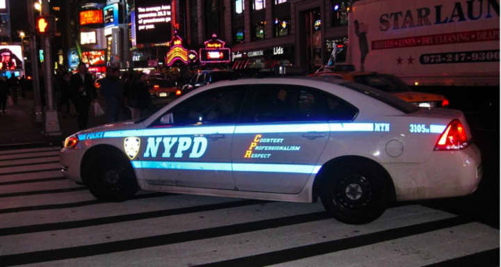 A Queens man was charged with arson of NYPD vehicle