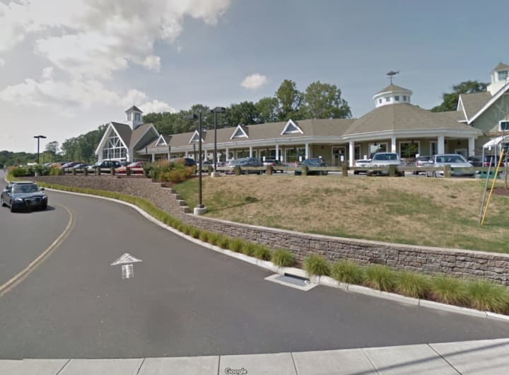 A girlfriend damaged a car at Whole Foods in Darien.