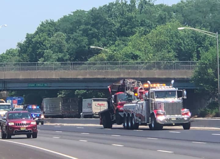 Traffic backed up along the southbound side of Route 287 after a crane overturned Monday morning.