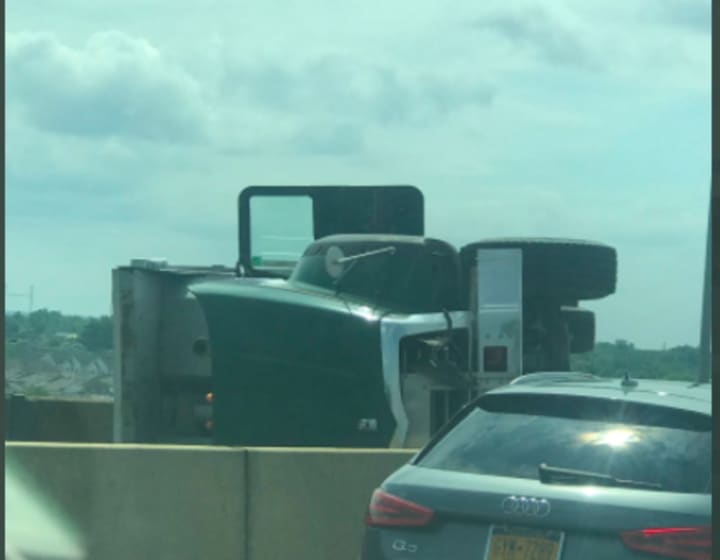 Overturned tractor trailer shuts Route 440 Eastbound at the Outerbridge Crossing going into New Jersey.