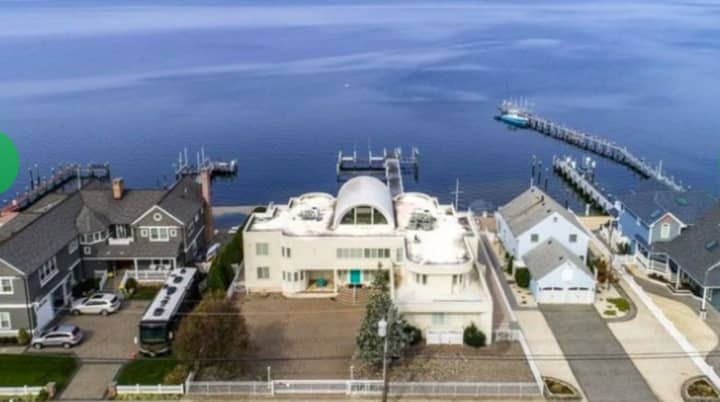 Joe Pesci&#x27;s $6.5 million bayfront mansion in Lavallette and a neighbor&#x27;s long disputed dock (far right) approved by the state in 2018.