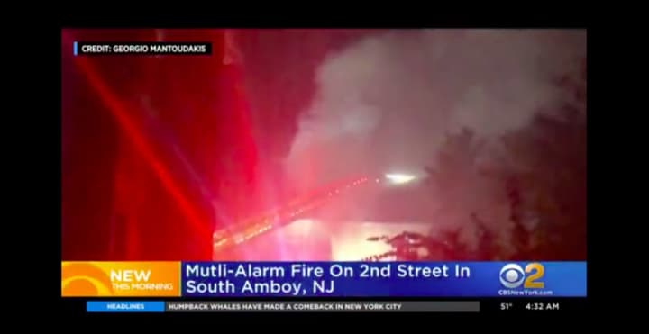 A three-alarm fire in South Amboy. (Courtesy CBS News NY)