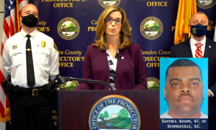 Camden County Prosecutor Jill S. Mayer, center, and Somerdale Police Chief James Walsh , left, at a news conference in December 2020 after an arrest in a 1999 rape, robbery and attempted murder case. A photo of the suspect, 46, is at the lower right.