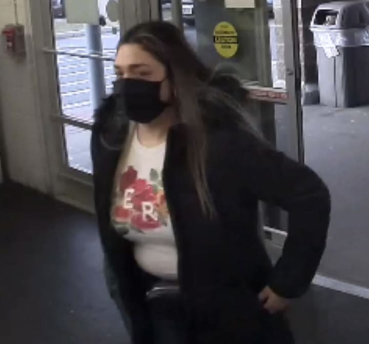 A woman is wanted for allegedly stealing credit cards and later using them at Walmart in Commack.