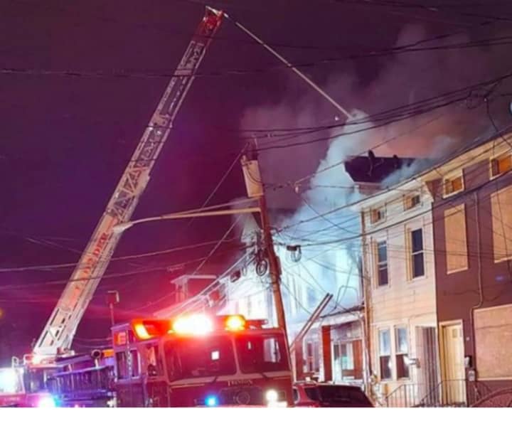 Firefighters at the scene of a fatal fire on Elm Street. (Courtesy Peterson&#x27;s Breaking News of Trenton)