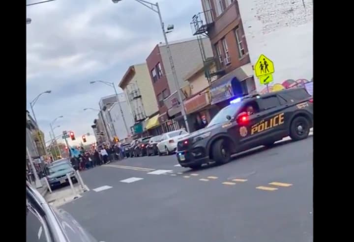 Marchers chant &quot;F--- the pigs&quot; while moving toward a Jersey City police vehicle during a police brutality protest last weekend.