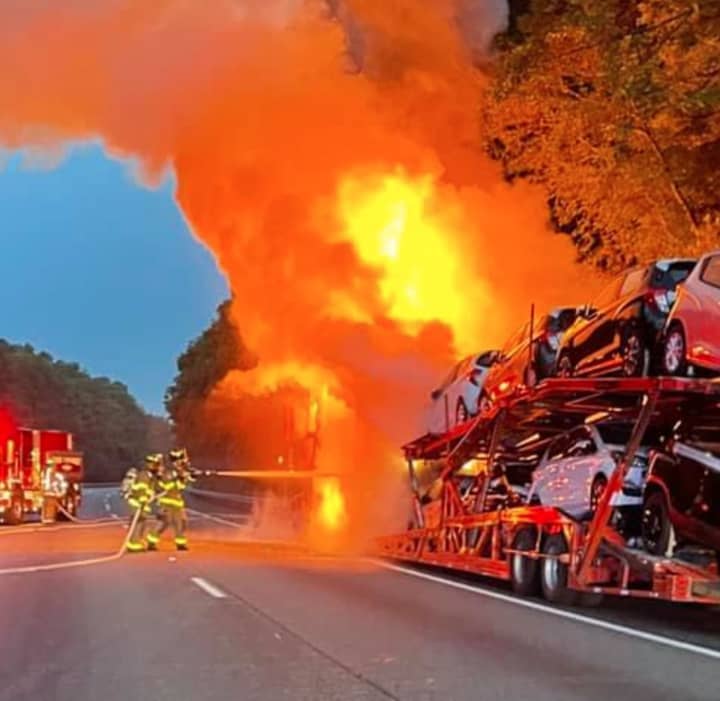 A car-carrying trailer went up in flames on Route 80 westbound Thursday morning, prompting a quick and efficient response from surrounding fire crews.
