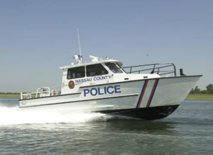 Nassau County Police Marine 1 Unit rescued two after a sailboat overturned.