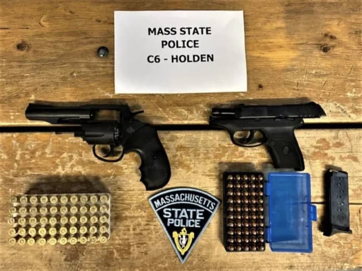 A traffic stop by Massachusetts State Police led to the arrest of a man who was busted with weapons and drugs.