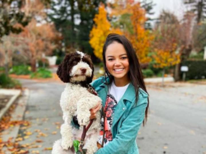 Nia Morgan and her dog, who she is referring to as &quot;Z&quot; for his safety. She purchased the dog in 2020 when he was two months old.