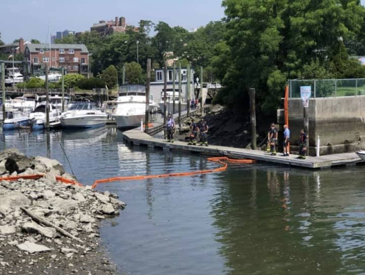 Crews worked quickly to mitigate the damage following a manhole explosion in New Rochelle Harbor.