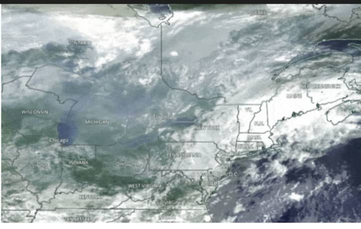 The Aqua satellite shows smoke descending from Canada into the Northeast from Friday, July 16 to Tuesday, July 20.