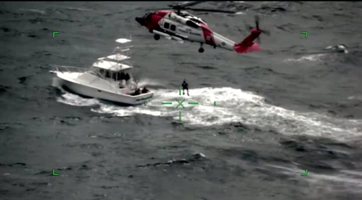 US Coast Guard rescues boaters stranded in storm.