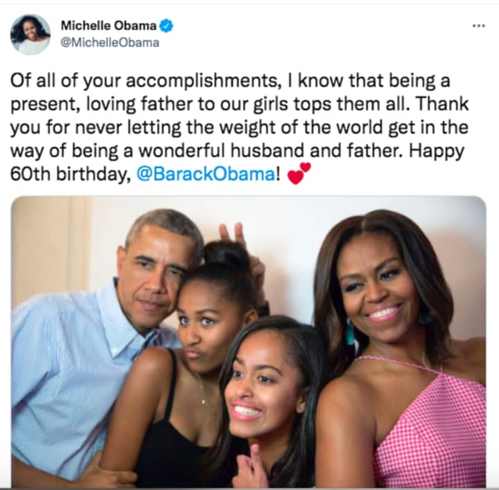 A tweet by former First Lady Michelle Obama marking the 60th birthday of her husband. The two are shown with their daughters.
