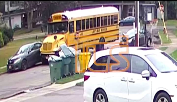 A school bus plowed into parked cars as captured on video by The Lakewood Scoop.