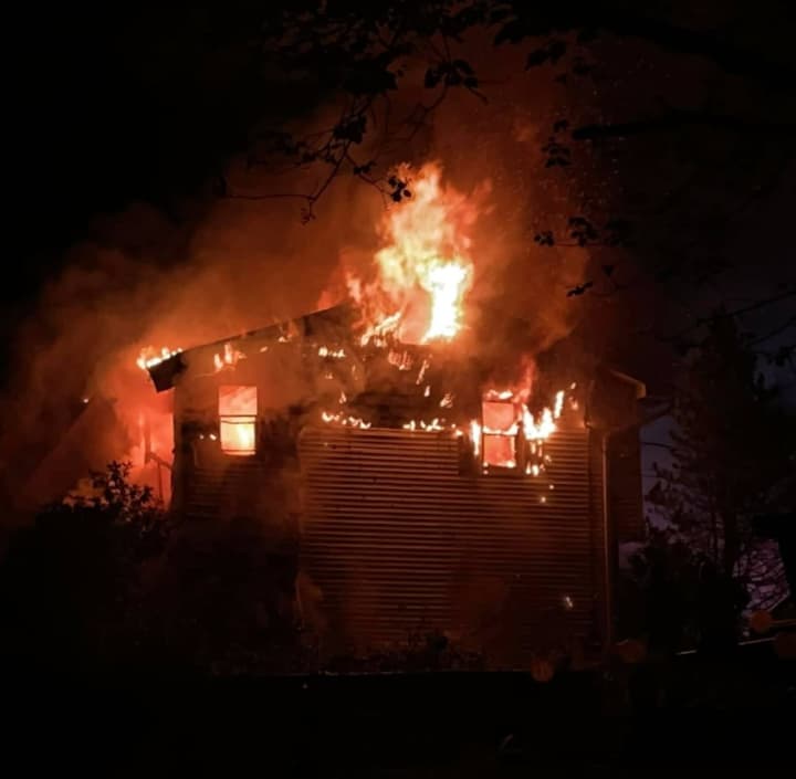 Fire crews rushed to douse a Warren County home that went up in flames before dawn Tuesday.
