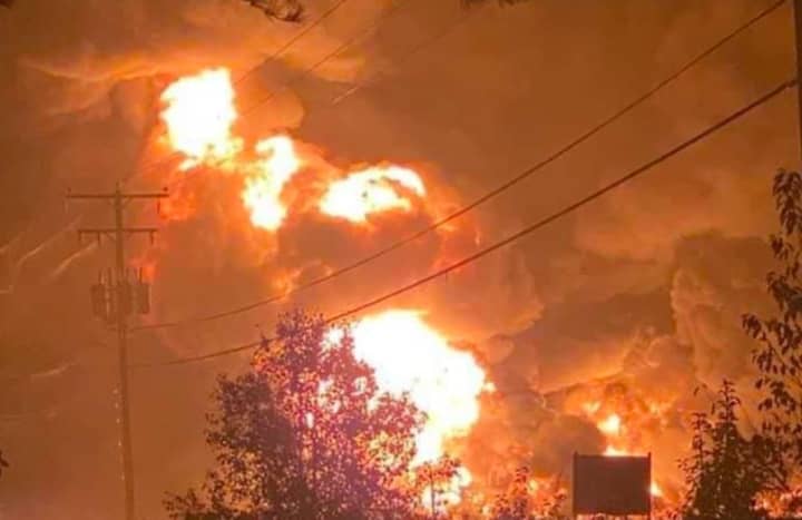 A gas explosion is suspected to have sent this ball of flames flying from a tanker truck crash.