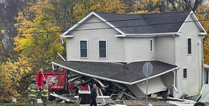 A dump truck crashed into this home on White Horse Pike (Photo courtesy of Photo by Nick Rifice/ Breaking AC)