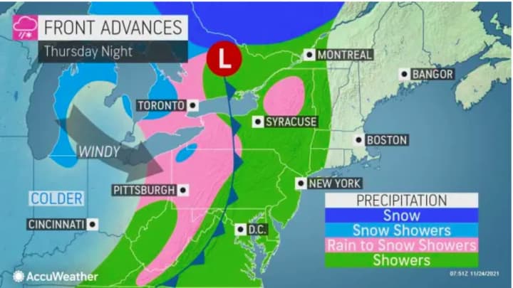 A look at areas in the Northeast where showers (green) and snow showers (pink) are expected on Thanksgiving night on Thursday, Nov. 25.
