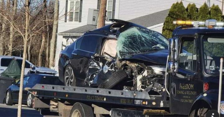 The car involved in a collision with a garbage truck. (Photo courtesy of Ocean County Scanner News (OCSN))