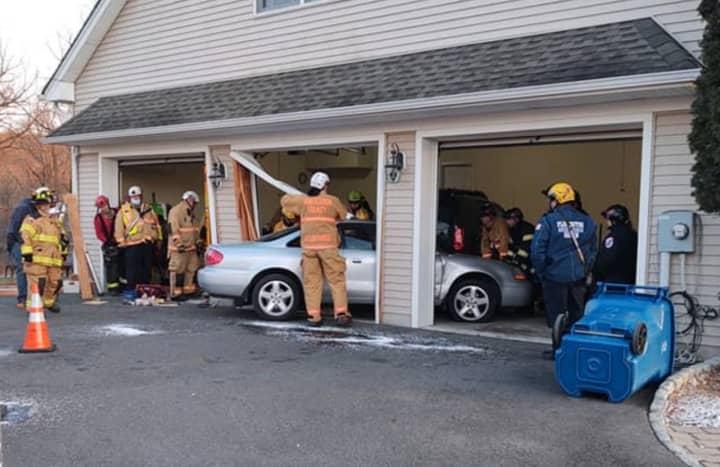 A car barreled into a home in Alexandria Township shortly before 3:50 p.m. Saturday, according to the Hunterdon County Technical Rescue Task Force.