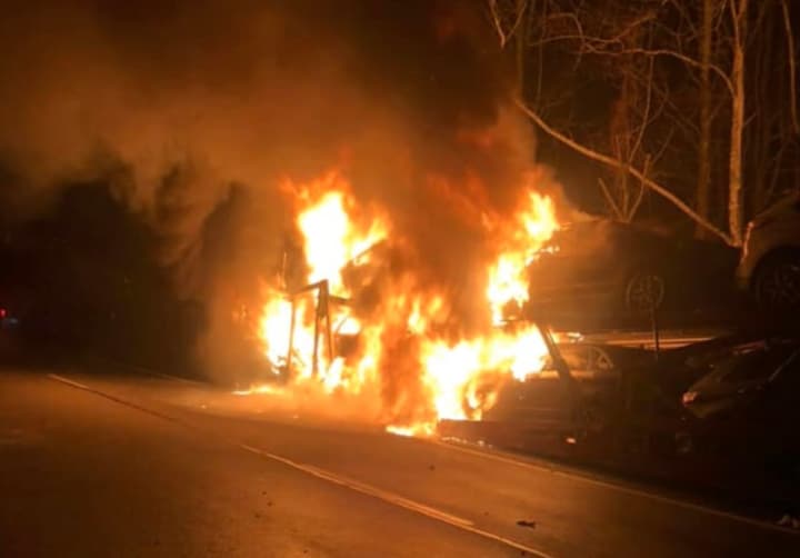 Four vehicles were destroyed as a car carrier went up in flames on Route 80, authorities said.