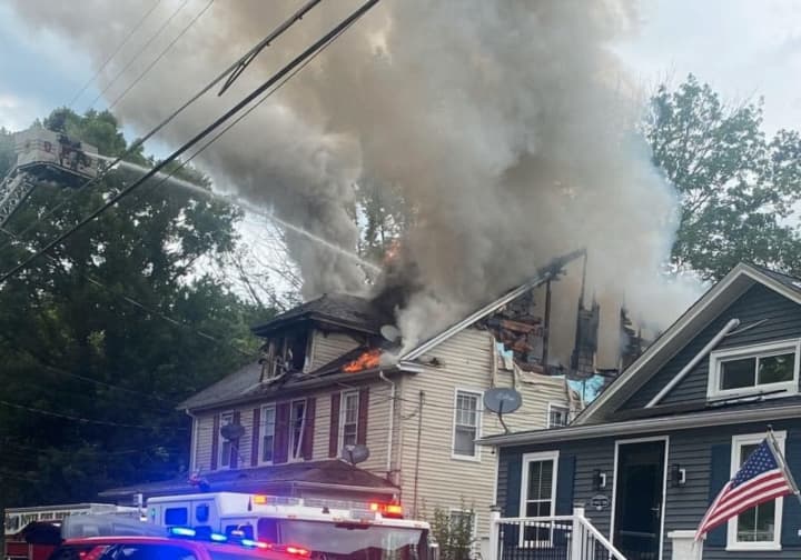 At least two residents were hospitalized as a massive fire ripped through a Morris County duplex, authorities said.