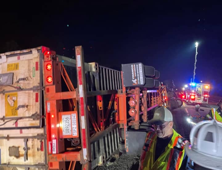 A tractor-trailer overturned and shut down multiple lanes of Route 80 in Morris County, authorities said.