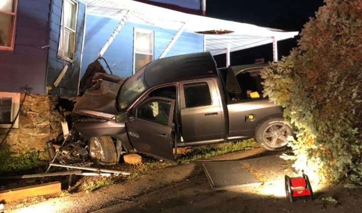A pickup truck driver was hurt after crashing into a Hunterdon County home and causing major damage, authorities said.