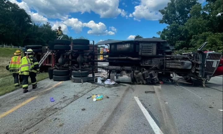 An overturned tractor-trailer caused a massive diesel spill on Route 80, authorities said.