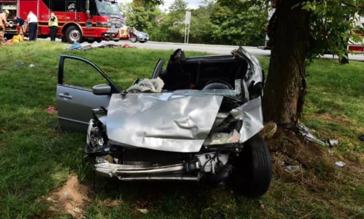 A driver was hospitalized after a Honda collided with a dump truck and struck a tree on Route 78, state police said.
