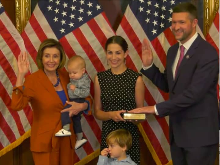 Speaker of the House Nancy Pelosi swears in new Congressman Pat Ryan on Wednesday, Sept. 14 who was joined by his family for the occasion.