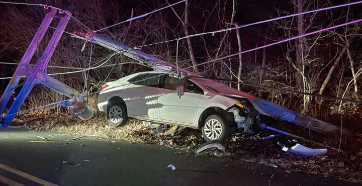 A crashed vehicle that took down a power line was found abandoned in Sussex County over the weekend, authorities said.