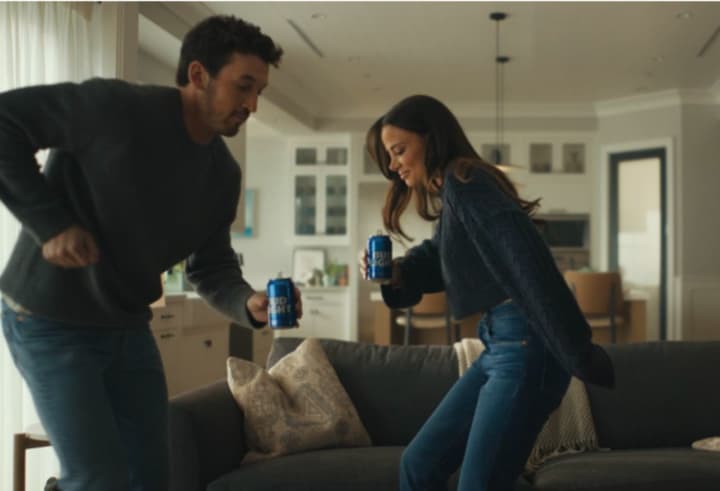 Miles Teller and wife, Keleigh, in Bud Light&#x27;s Super Bowl ad.