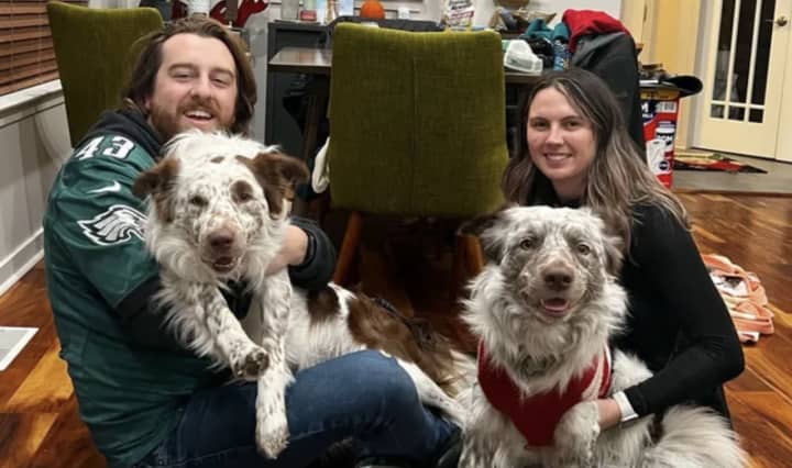 Jake and Liz with their dogs, Philip and Travis