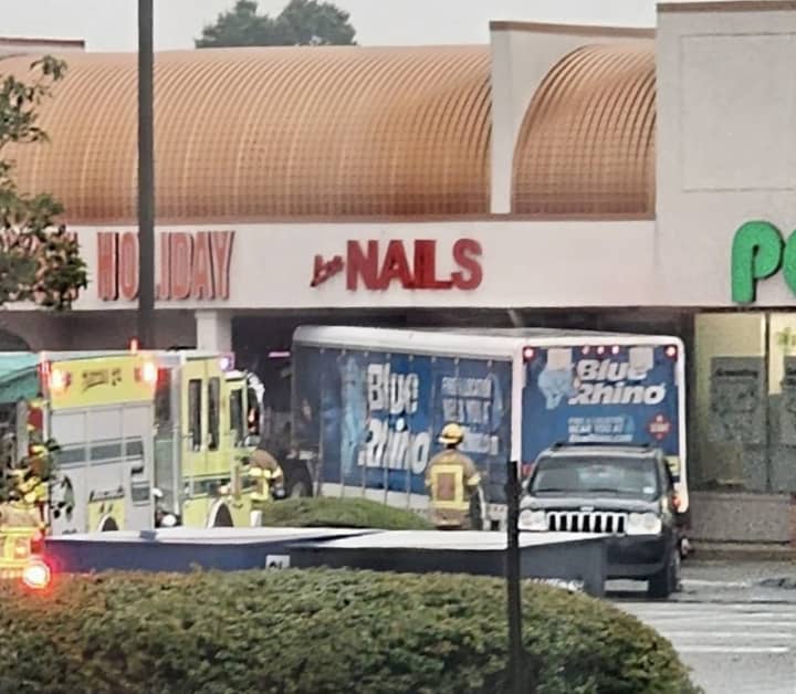 A truck carrying propane slammed into Chicken Holiday&#x27;s entrance after plowing through two SUVs parked in front of Pets Supplies Plus after running a red light. Wednesday July 19 near Berkeley Plaza. (Photo Courtesy Ocean County Scanner News (OCSN))