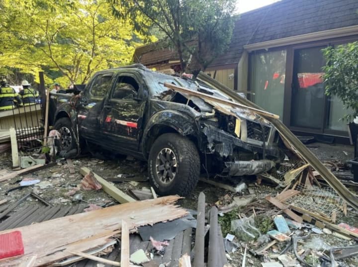 A pickup smashed into a home on Wednesday, Aug. 2 in Howell.