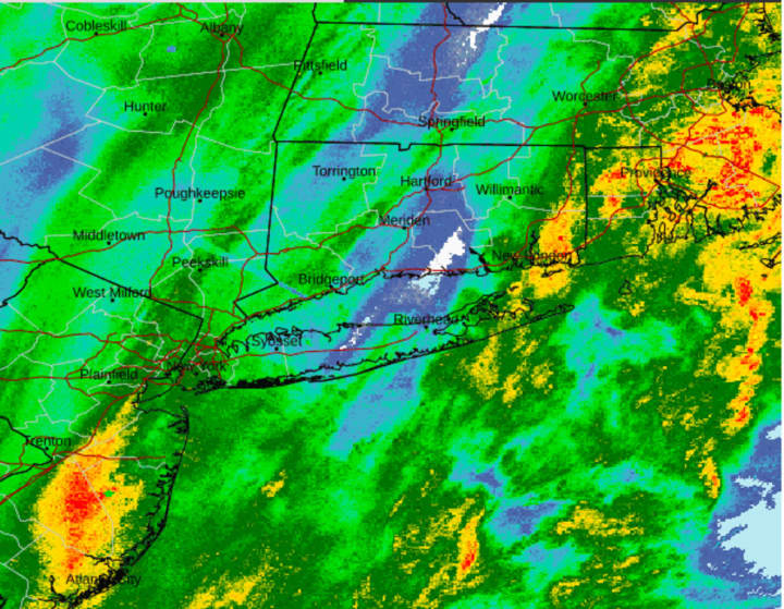 A radar image of the region just before 6:30 a.m. Monday, Dec. 11 shows bands of heavy rain (shown in orange) moving northeast in both New Jersey (at left) and eastern New England (at right).