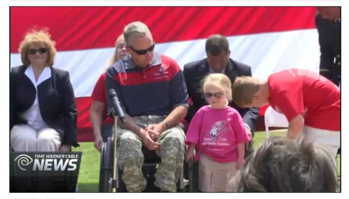 Stephen Valyou, an Army veteran wounded in Iraq in 2007, was presented with a smart home Thursday provided by the Stephen Siller Tunnel to Towers Foundation.