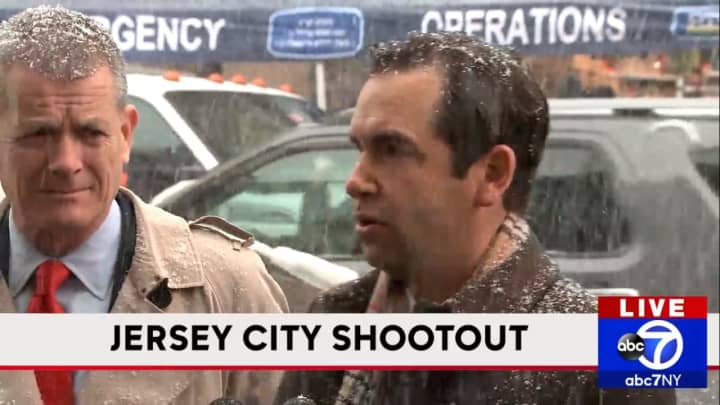 James Shea (left), Jersey City&#x27;s public safety director, and Mayor Steven Fulop address reporters Wednesday