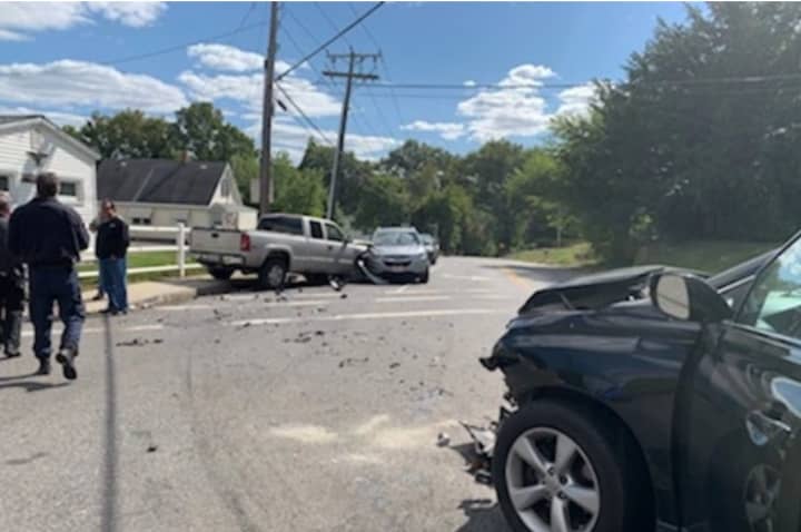 The scene of a three-car crash on Sept. 20 in Ludlow. Among other things, Andrew Milne is accused of causing the crash by driving on the wrong side of the street.