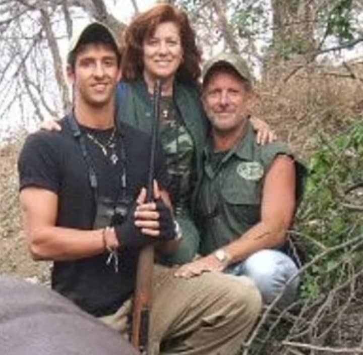 Bianca and Lawrence Randolph with their hunting safari guide in Zambia.