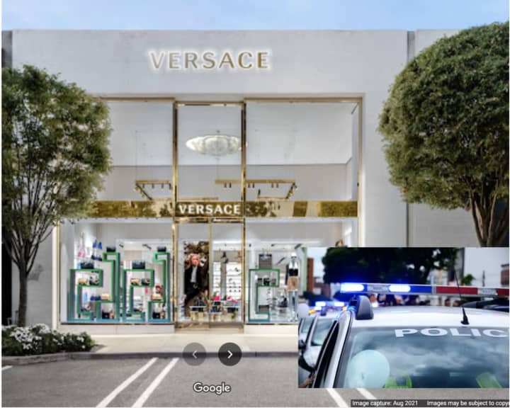 Three suspects made off with more than $24,000 in Versace handbags during a grab and run robbery.