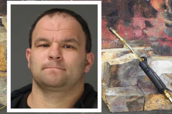 Zachary Robert Gilbaugh, a blowtorch and cider blocks similar to the ones he aimed at law enforcement on Feb. 1, 2022.