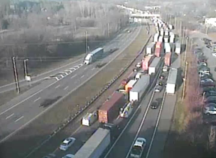 An overturned tractor-trailer caused major delays on Route 78 westbound early Wednesday morning, developing reports say.