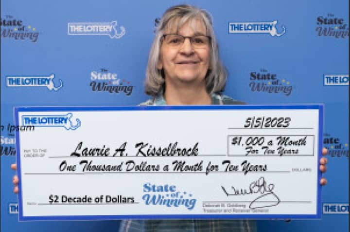 Laurie A. Kisselbrock of Dalton won $12,000 a year before taxes on a $2 lottery ticket at the Dalton Food Mart.