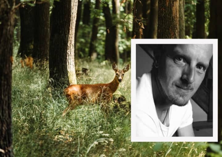 Michael A. Lloyd and a white-tailed deer.