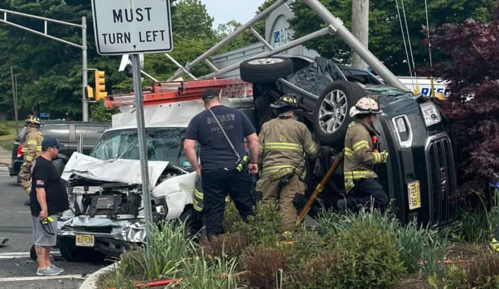 Four people were hurt, including a 14-year-old girl, during a two-vehicle crash that took down a traffic signal at a Hackettstown intersection Tuesday, May 16, authorities said.