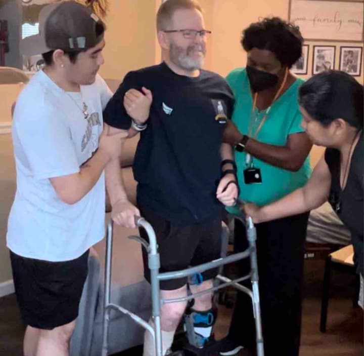 Colin Coakley stands up for the first time, nearly six weeks after a 3-car crash left him in the ICU with serious injuries on Monday, June 19.